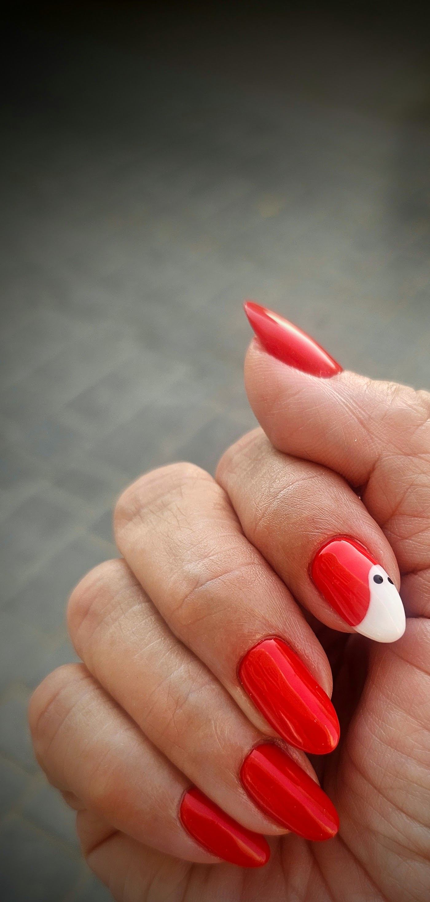 Glossy red gel nails