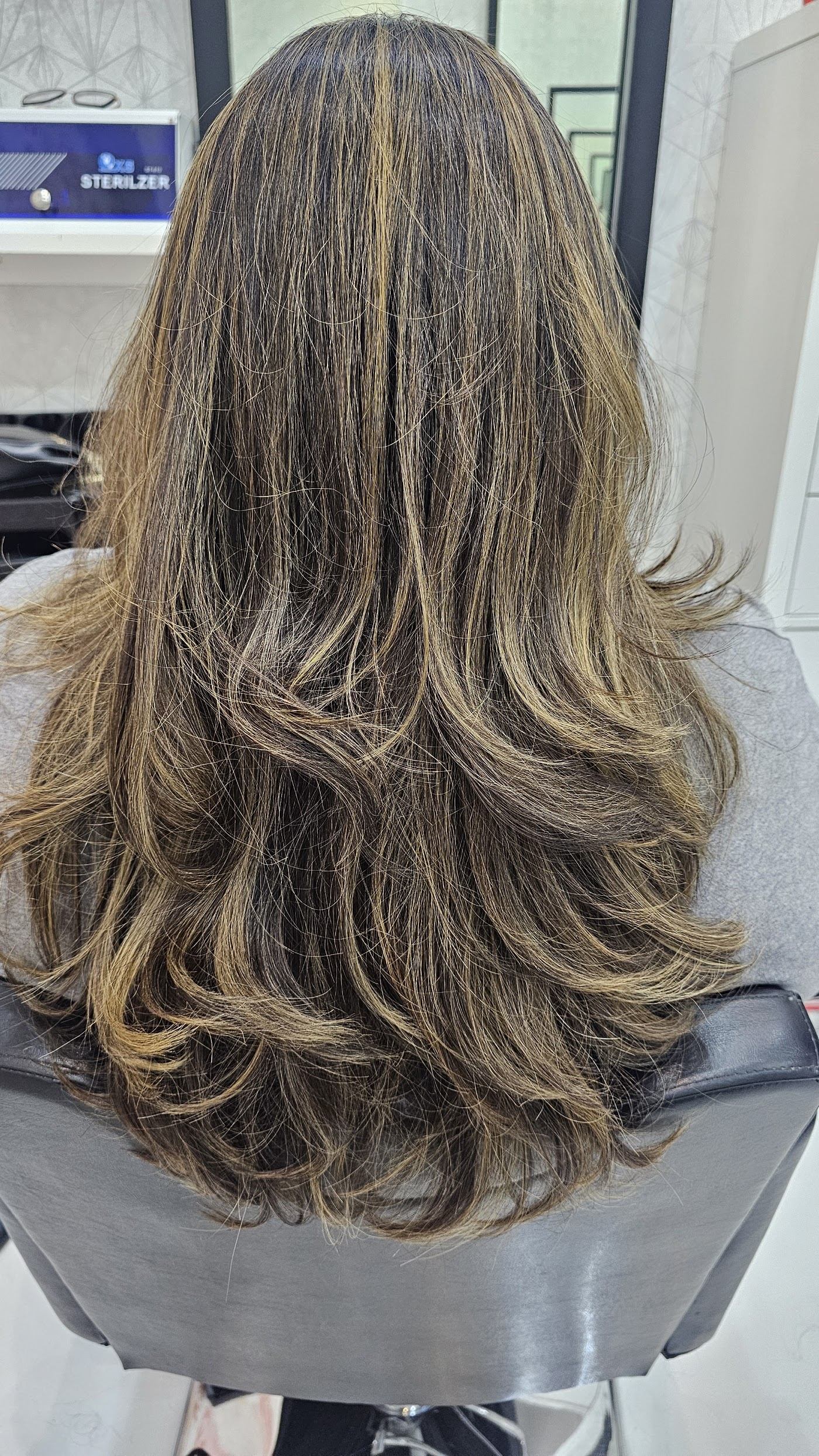 Soft caramel balayage on long hair