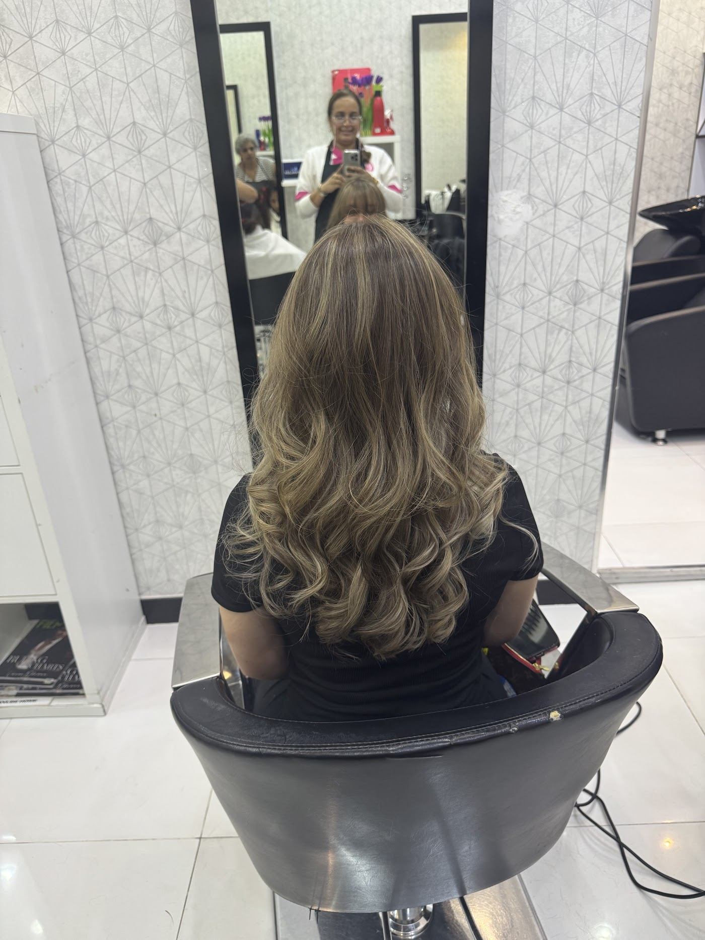 Honey blonde balayage curls